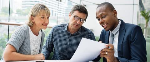 people reviewing documents